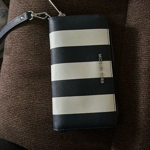 Michael Kors blue/white striped wallet/wristlet. Pre-owned
